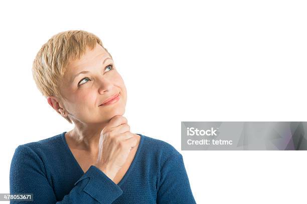 Thoughtful Woman With Hand On Chin Looking Up Stock Photo - Download Image Now - Women, Contemplation, One Woman Only