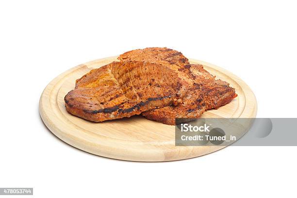 Grilled Steaks On Chopping Board Stock Photo - Download Image Now - 2015, Barbecue - Meal, Cut Out