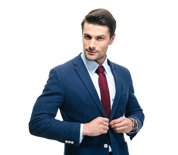 istock Confident businessman putting on suit jacket 478054848