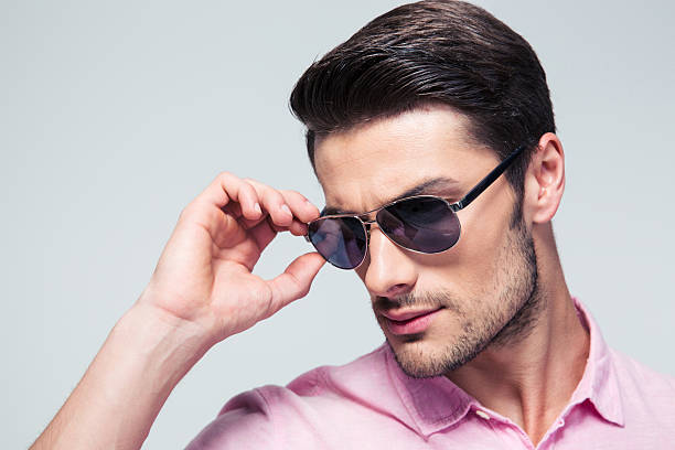 istock Confident man in sunglasses and shirt 478055218
