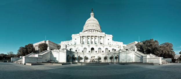 Panorama of the United States Capitol Building, Washington DC. A view from the street. An image compromised of more tahn 10 photos stiched together.