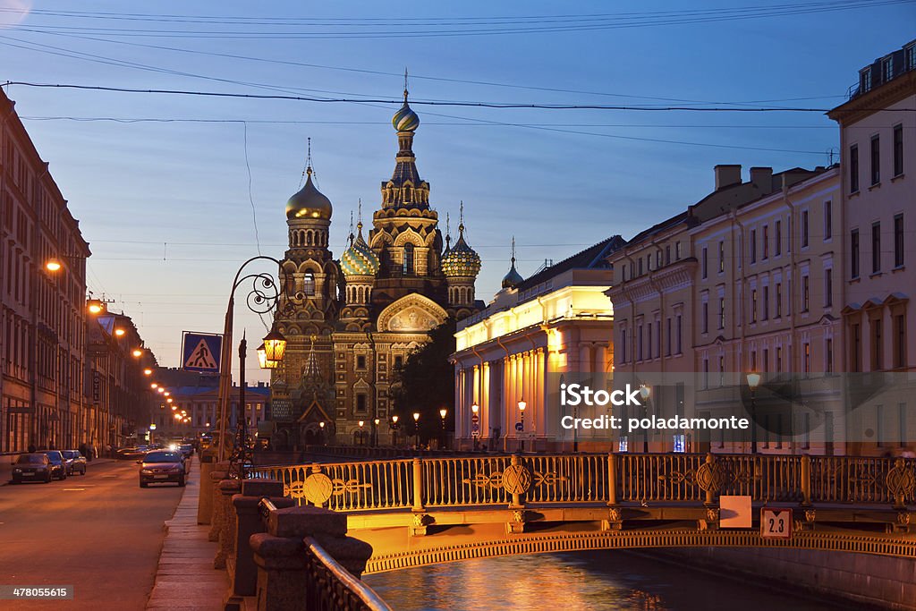 Iconic church of the Savior on blood, St Petersburg, Russia Iconic, colorful and beautiful church of the Savior on blood at the side of a canal at dusk, St Petersburg, Russia Canal Stock Photo