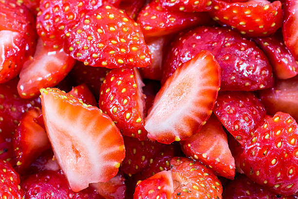 istock background of sliced strawberries 478055662