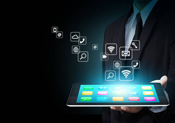 istock Tablet with cloud of colorful application icons 478059625