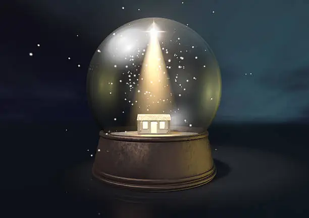 A regular snow globe depicting a shining star and the nativity stable in bethlehem on a blue starry sky background