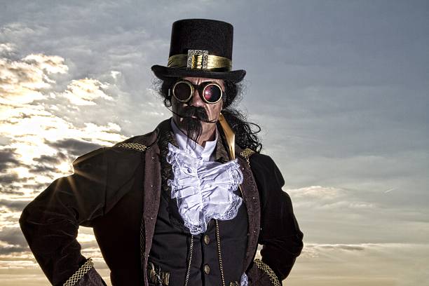 istock man dressed in vintage steampunk clothing with sunset background 478060870