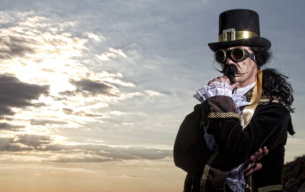 istock man dressed in vintage steampunk clothing with sunset background 478060872