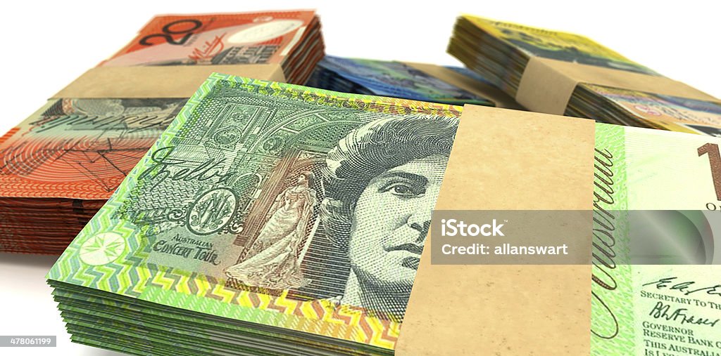 Australian Dollar Notes Bundles Stack Extreme Closeup A scattered pile of australian dollar bank notes bundled into value denominations on an isolated background Australia Stock Photo
