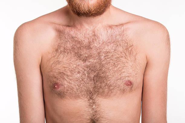 uomo petto villoso - hairy men shaving chest foto e immagini stock