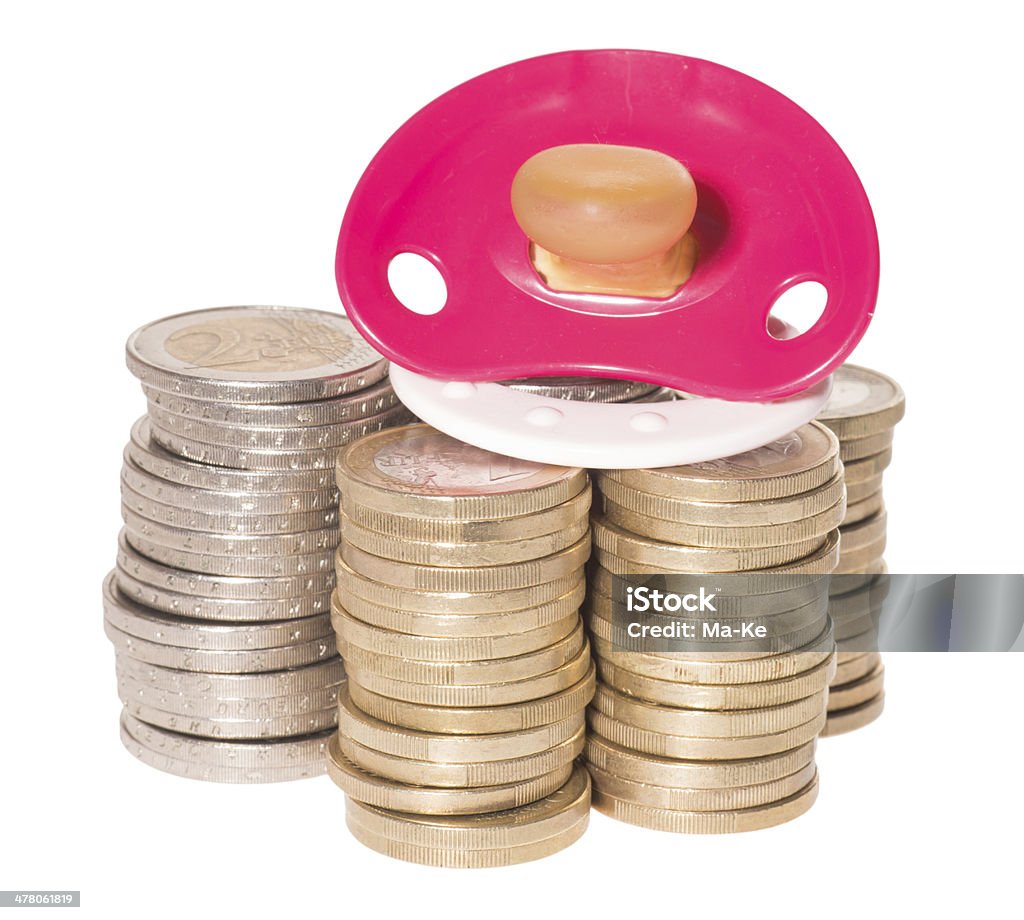 Expenses for a child Pacifier and euro coins isolated over a white background Coin Stock Photo