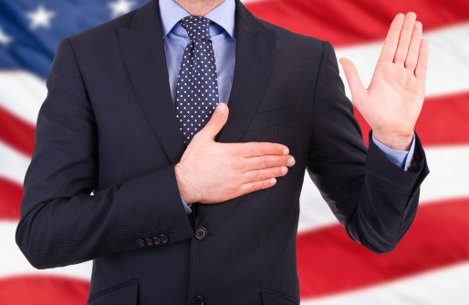 Businessman taking oath.