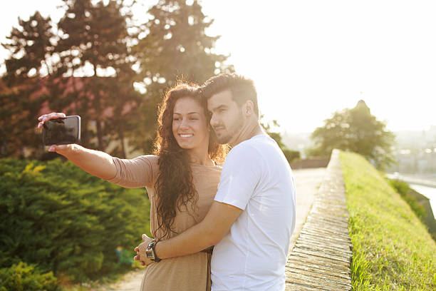 istock Couple Selfie in the Park 478064980