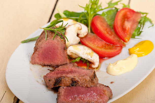 istock beef filet mignon grilled with vegetables 478067032