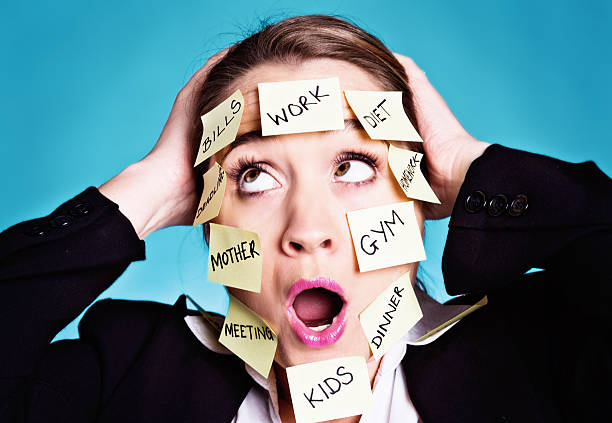 istock Woman covered with reminder labels rolls her eyes in desperation 478067799