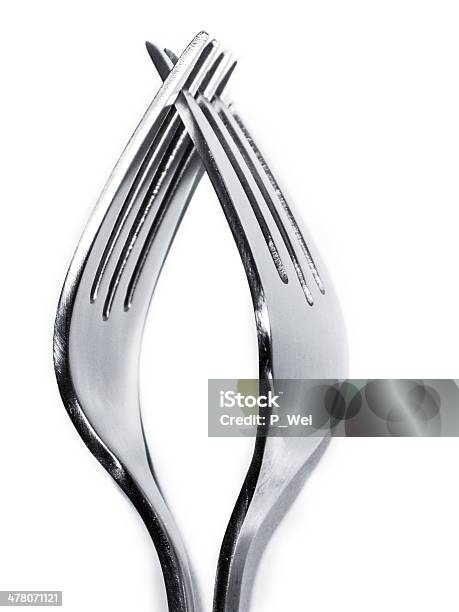 Touching Forks Stock Photo - Download Image Now - Cut Out, Fork, Holding