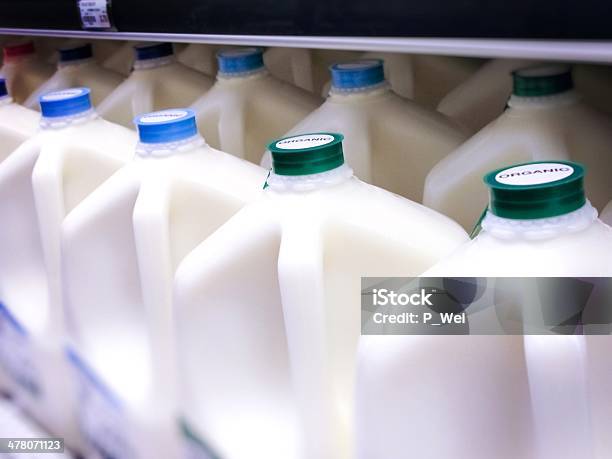 Gallon Jugs Of Organic Milk At The Supermarket Stock Photo - Download Image Now - Milk Jug, Milk, Supermarket