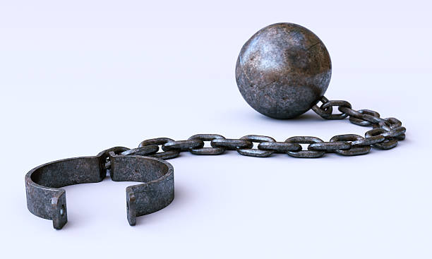 Chain-and-ball A02 Rusty old chain and ball / shackles with an attached weight, lying open pure white surface. The shackles material is rusty and rugged. The whole scene is isolated on a pure white background. chain object photos stock pictures, royalty-free photos & images