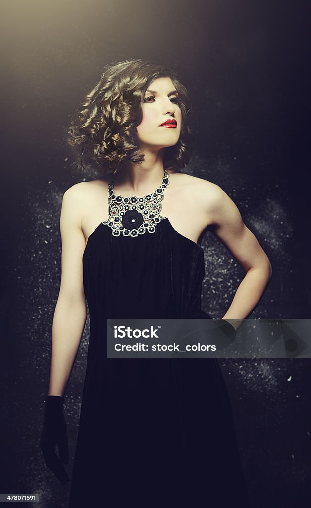 diva elegant woman wearing dress and gloves. 1930-1939 Stock Photo