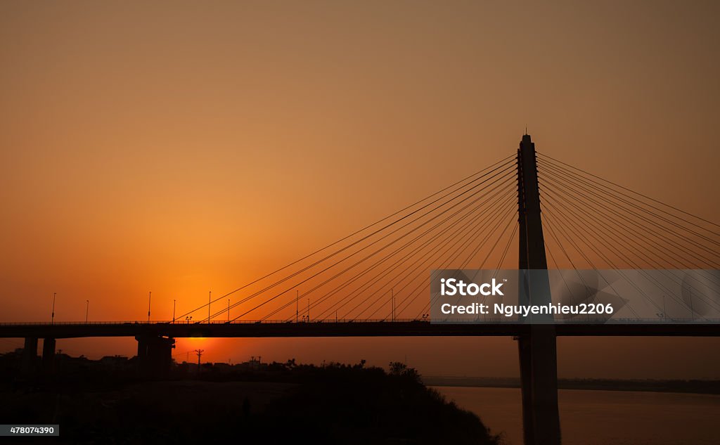 Nhat Tan Bridge in Sunset Red River (Asia) in Hanoi, inaugurated on 4 January 2015. Abstract Stock Photo