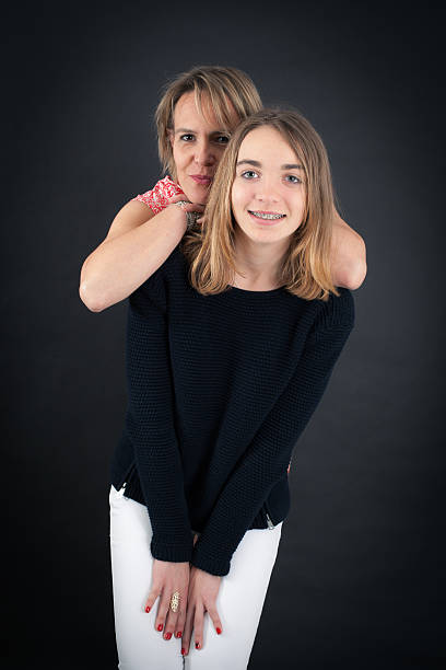 istock Beautiful family doing different expressions in different sets of clothes 478074846