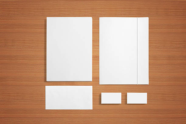 istock Blank stationery set on wooden background 478075225