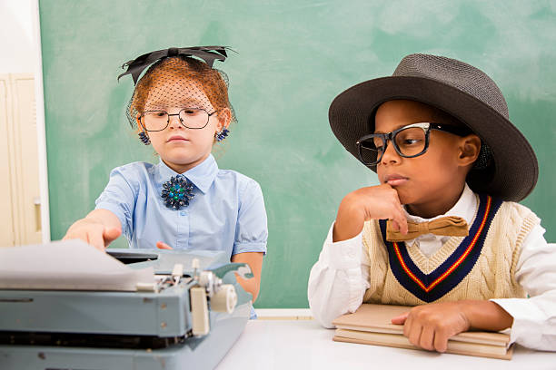 istock Business:  Secretary and her co-worker at desk with typewriter. 478076313