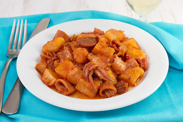 istock squid with potato on the white plate 478076375
