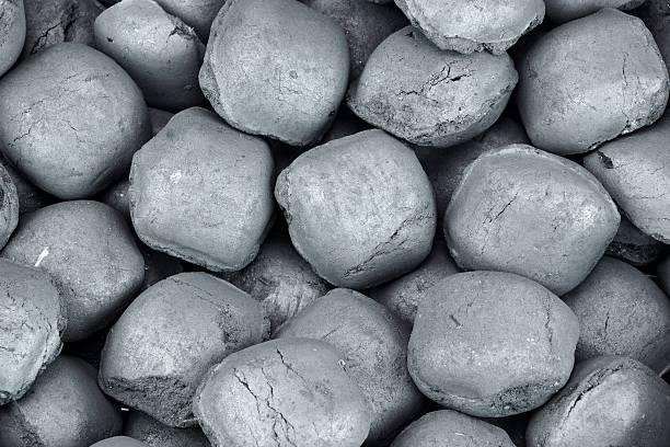 istock Charcoal Briquettes Background Texture 478076956