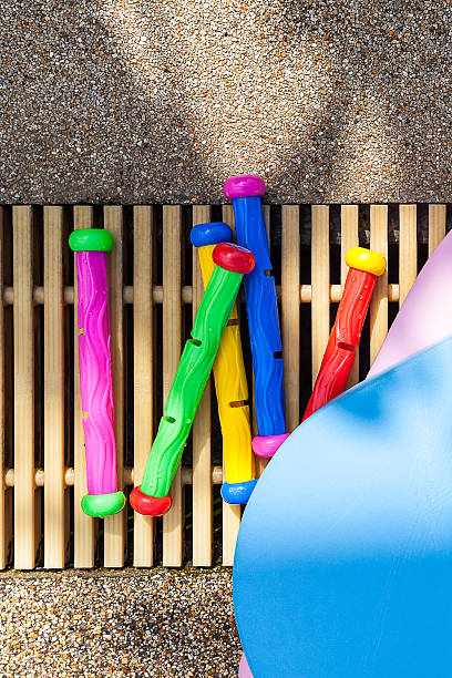 istock Swimming board and toy lay on pool floor 478080572