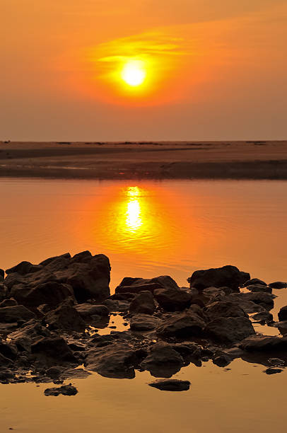 istock Sea stones and sunset 478081587