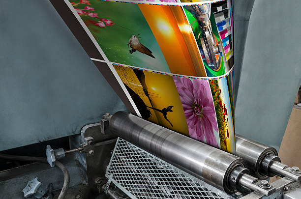istock Large webset offset printing press running a long roll paper 478083648