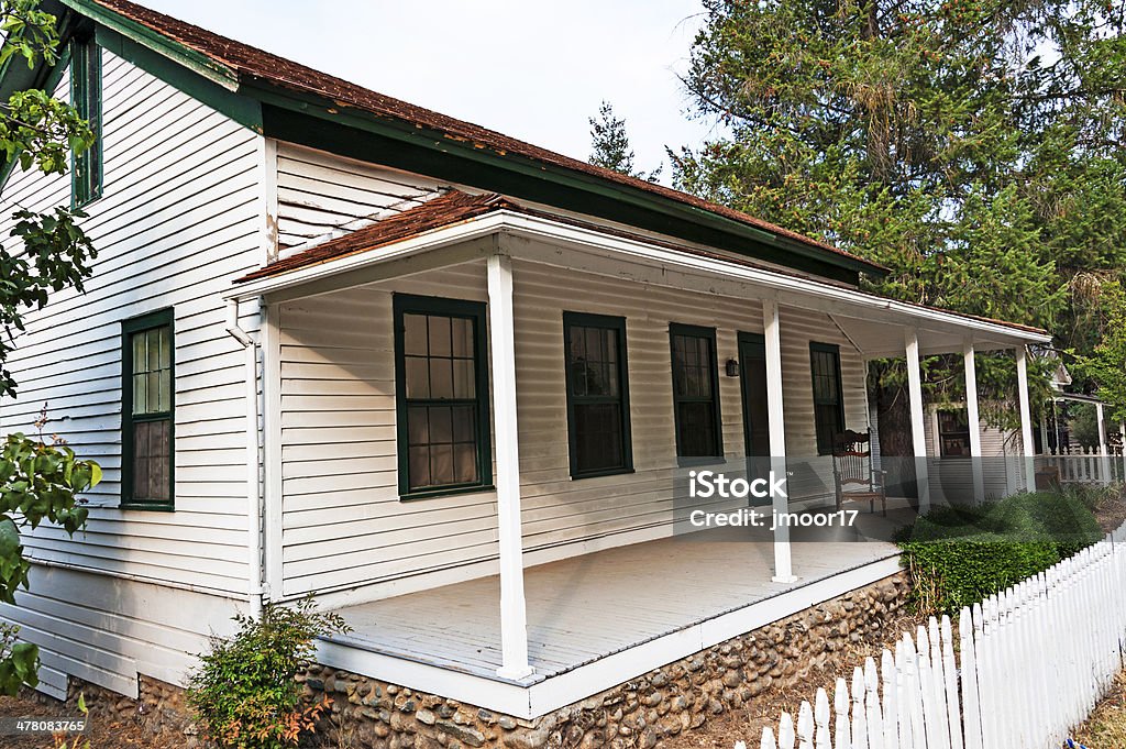 Historic Home with Picket Fence This home with white picket fence is in the Gold Discovery State Park in Coloma, this is one of restored homes from the Gold Rush Era. Building Exterior Stock Photo