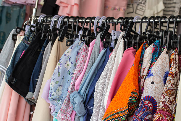 istock Shirts hanging on clothes line in shop 478086578