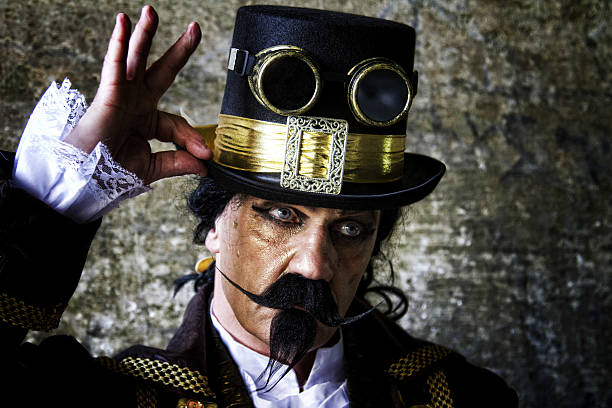 istock man dressed in steampunk, victorian clothing, dark wall background 478087194