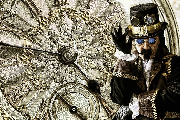 man dressed in vintage steampunk clothing with gold watch background man dressed in Steampunk clothing with gold watch background , a sub culture style that combines victorian dress with science fiction, industry and fantasy, steampunk fashion stock pictures, royalty-free photos & images