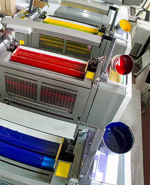 istock printing machine cylinders and printing ink pot 478087234