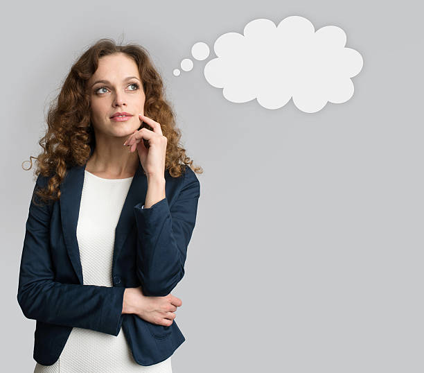 istock Thinking business woman looking up 478087514