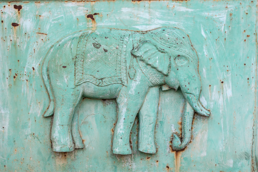 Cambodian elephant decoration of gates at royal palace turquoise color