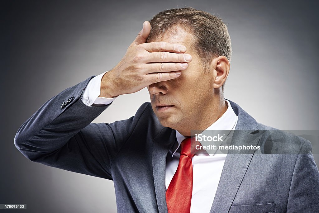 Politician seeing no evil Politician covering his eyes with hand 30-39 Years Stock Photo