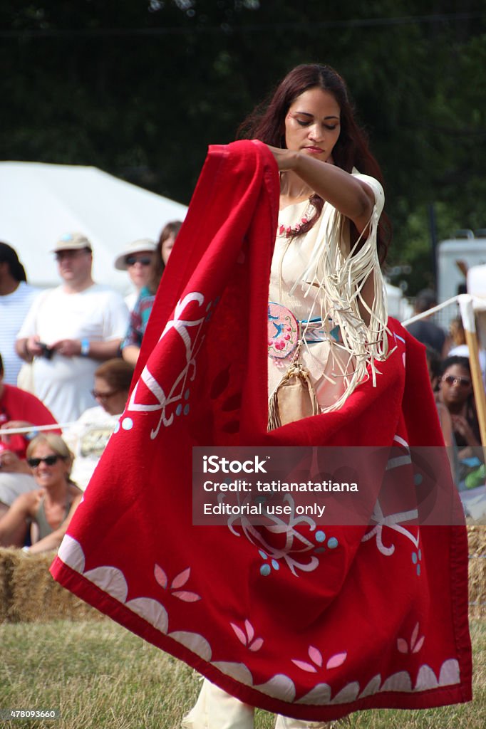 Native American Female Dancing at annual pow-wow Glen Oaks, NY, USA - July 26, 2014: Native American at annual pow-wow at Queens County Farm Museum. 2015 Stock Photo