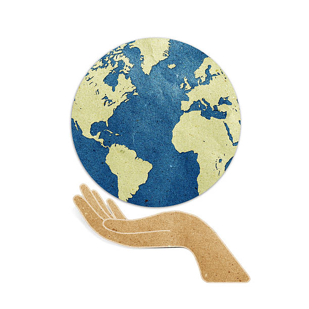 istock Hand and earth recycled paper 478094323