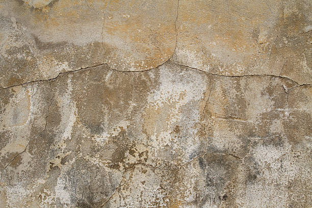 istock Weathered and cracked, old concrete wall - Stock Image 478096194
