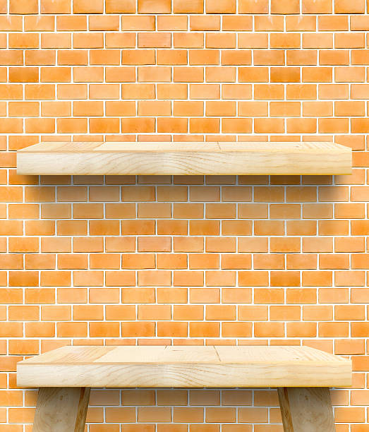 istock Empty Wooden Table top and shelf at orange bricks wall 478097548