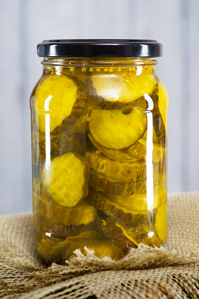 istock Sliced Pickles in Clear Glass Jar 478097817