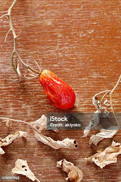 Mini Tomate Seco Foto de stock y más banco de imágenes de Alimento - Alimento, Arrugado, Con textura