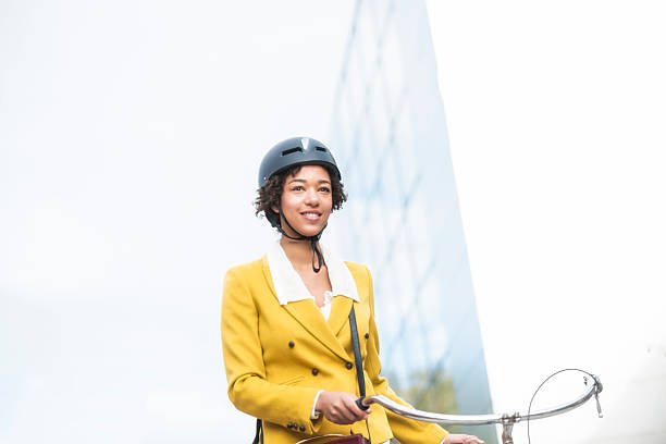 istock Young woman with bike 478098275