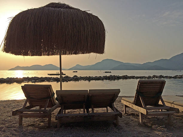 istock Beach Chairs and Umbrella on a beautiful island 478103198