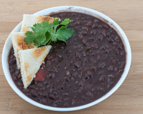 Delicious soup of black beans served the Cuban way. Traditional Cuban meal and an important source of vegetable protein in the island