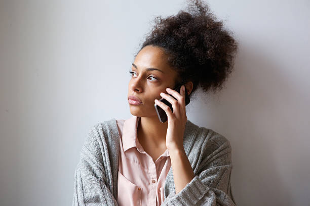 Young woman talking on mobile phone stock photo