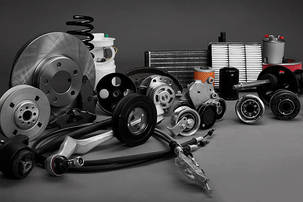 car parts New car parts on a gray background closeup. Shop for auto. The composition of the new auto parts gasket stock pictures, royalty-free photos & images